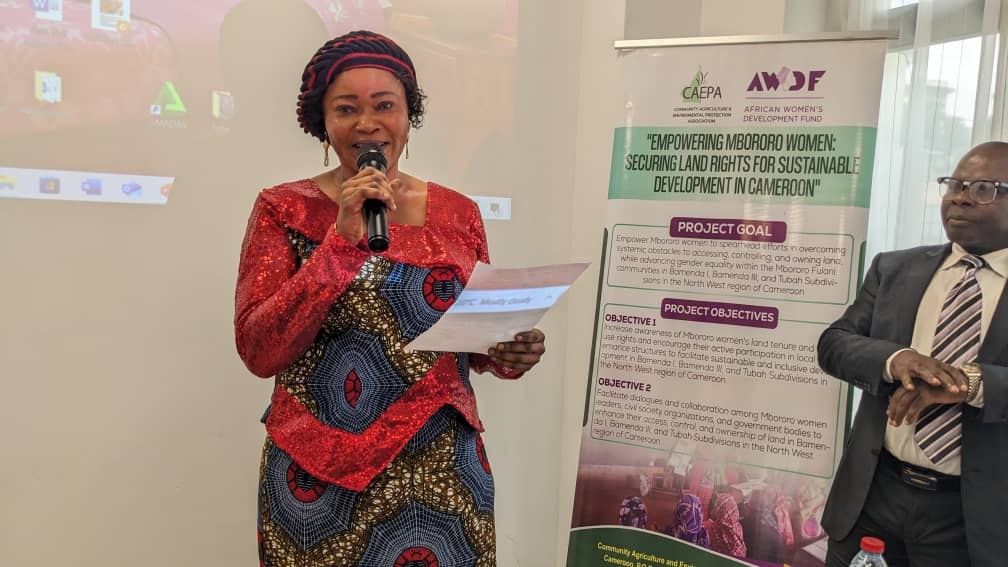 Government representatives addressing land law provisions